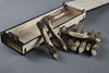 Candle set with wood paints and a case from a tree trunk